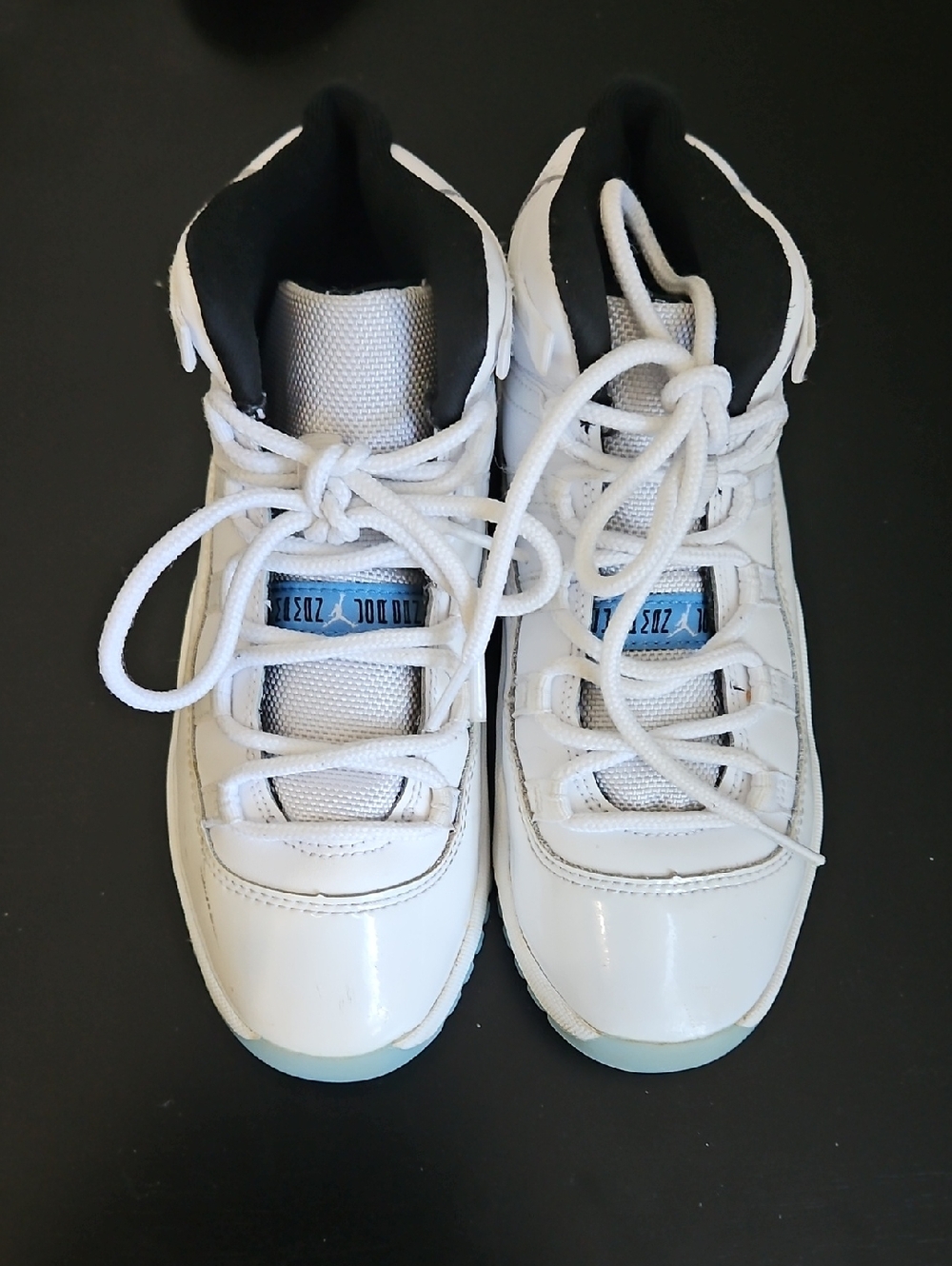Nike Kids White High-Top Sneakers with Black Collar and Light Blue Accents